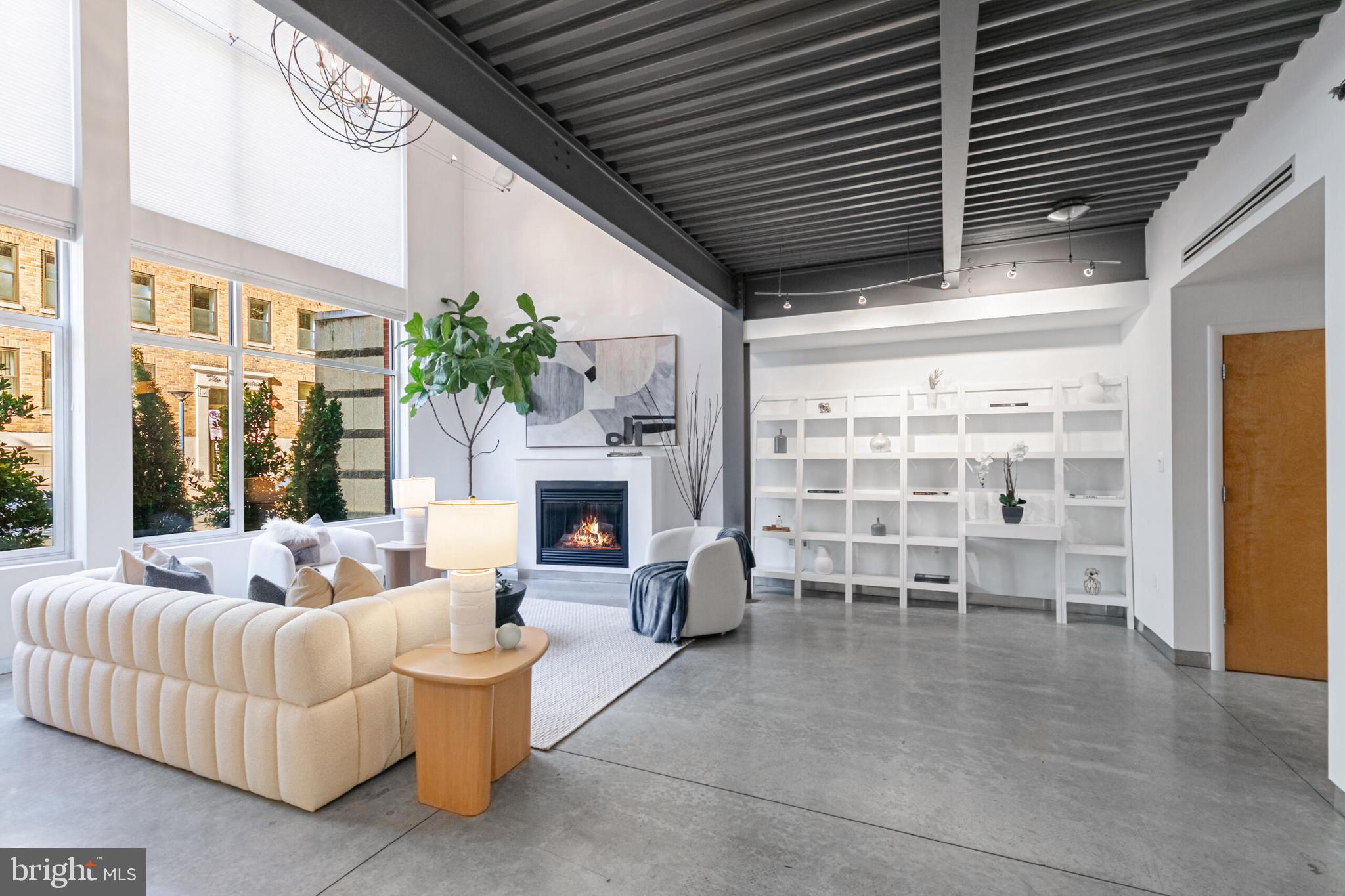 2351 Champlain Street Northwest, Unit C1 Washington, DC 20009 - Photo 8 of 34 a living room with furniture and a fireplace