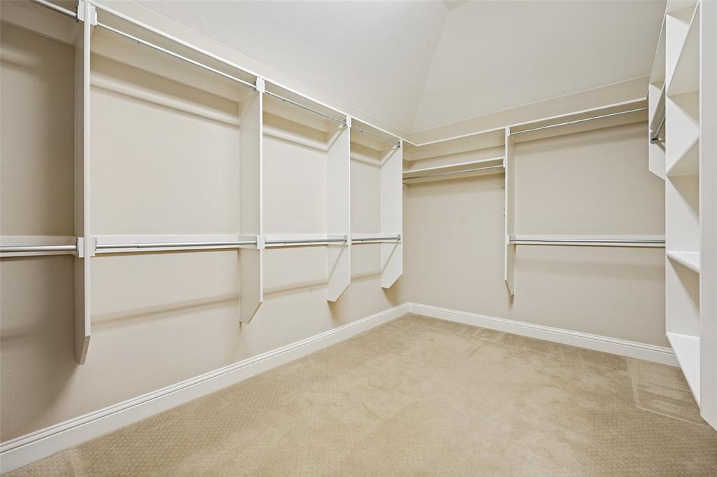 773 South Coppell Road Coppell, TX 75019 - Photo 21 of 30 a view of an empty walk in closet