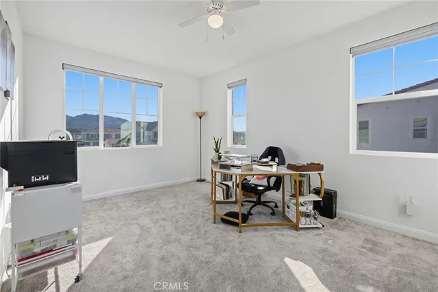 a workspace with wooden floor and a workspace