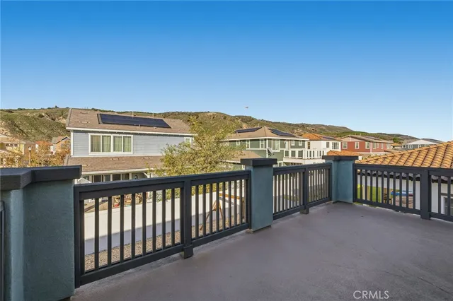 a view of a balcony with an ocean view