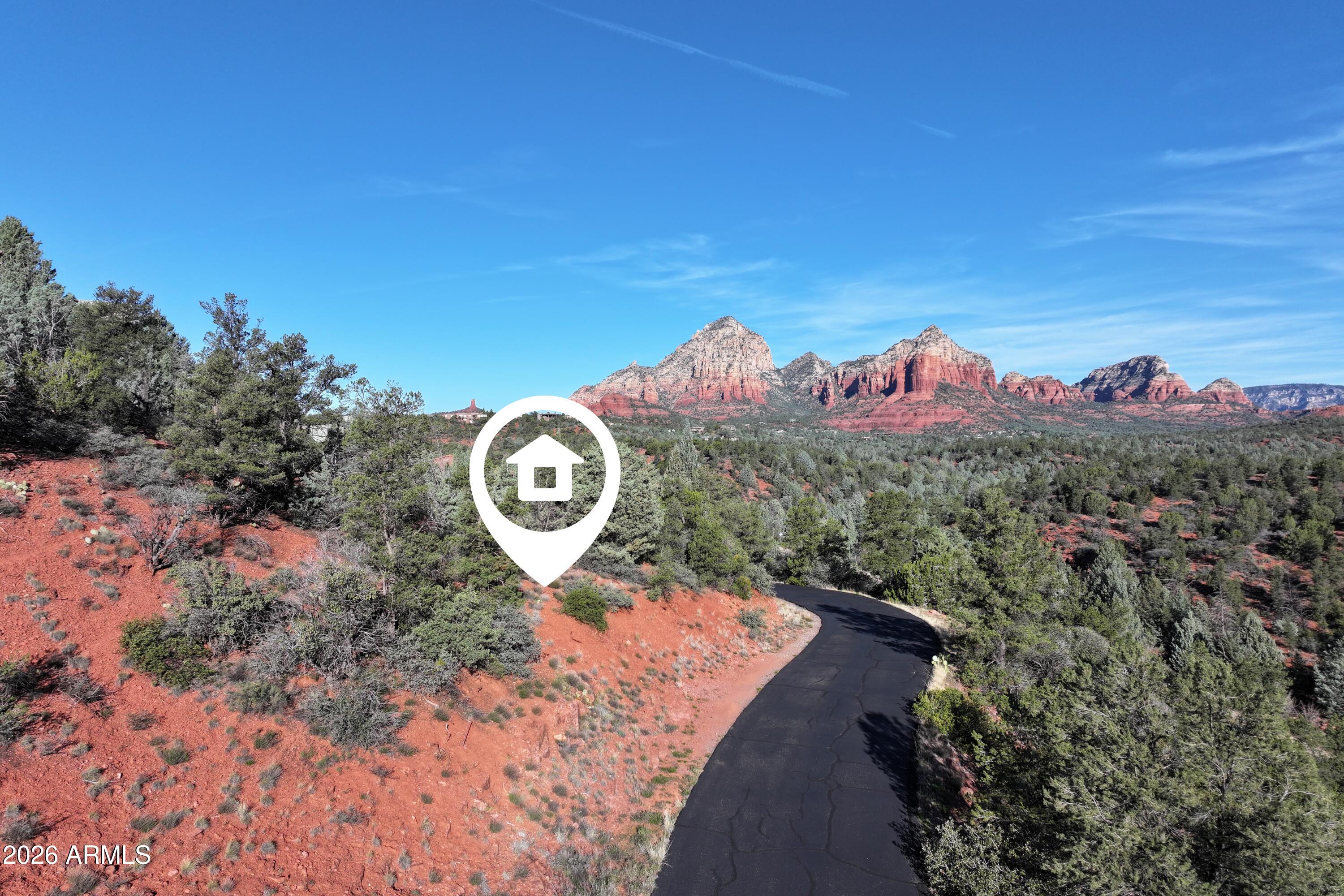 256 Barcelona Road, Unit 81 Sedona, AZ 86336 - Photo 3 of 14 a view of a pathway with a park