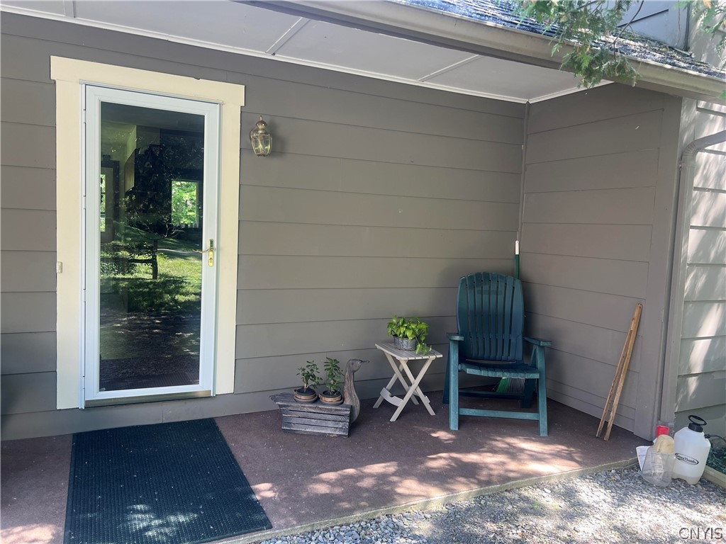 2778 Otisco Valley Road Marcellus, NY 13110 - Photo 3 of 44 Cool and comfortable side entry area to watch the