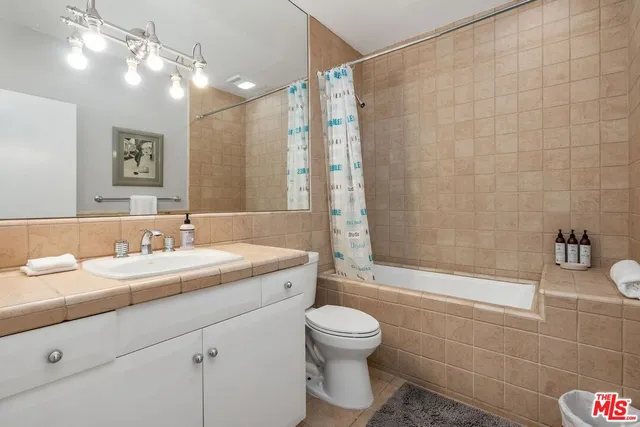 a view of a beach with a lake