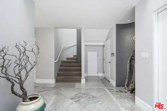 a view of entryway with stairs