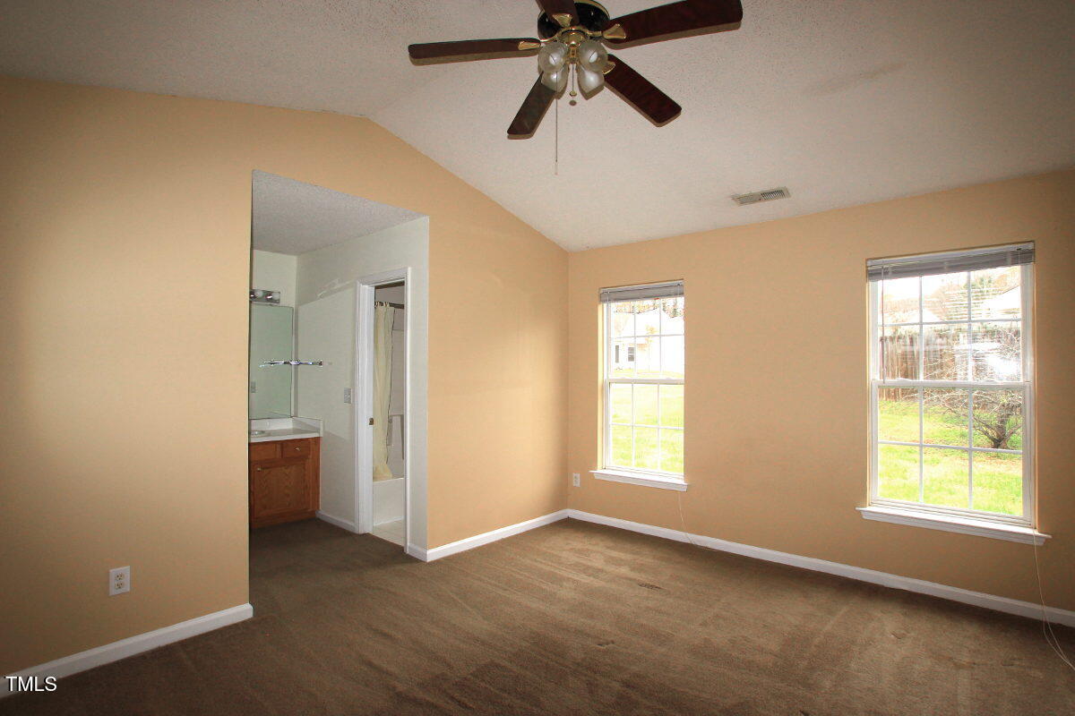 5201 Water Walk Lane Raleigh, NC 27616 - Photo 6 of 10 a view of an empty room with a window