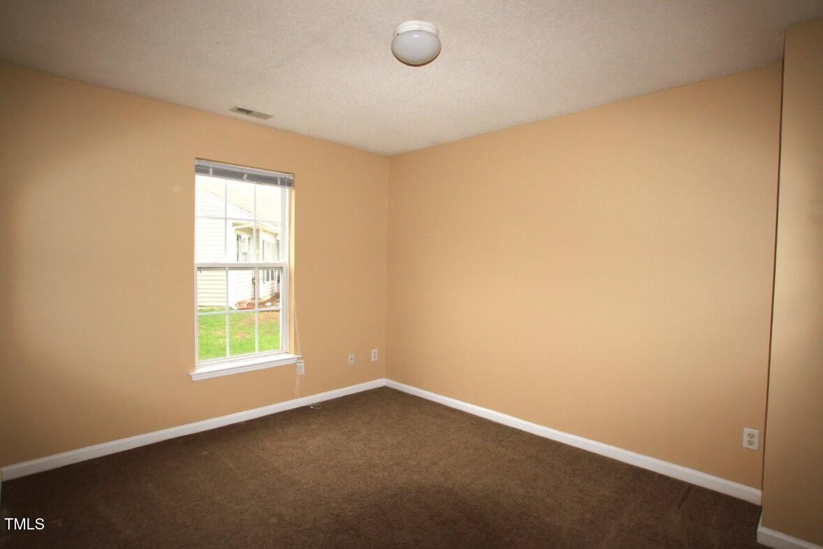 5201 Water Walk Lane Raleigh, NC 27616 - Photo 8 of 10 an empty room with windows