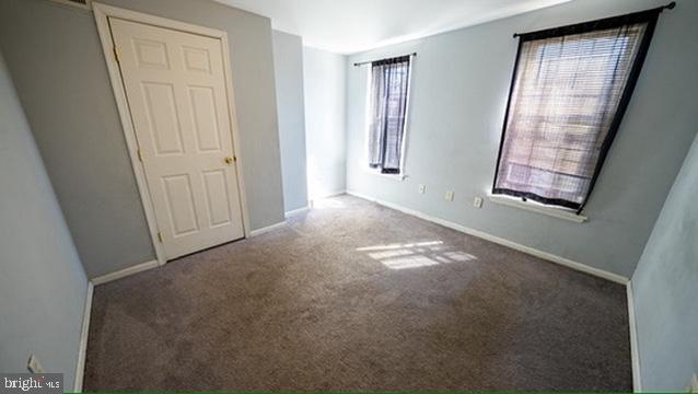 1911 Brunner Street Philadelphia, PA 19140 - Photo 6 of 12 an empty room with windows