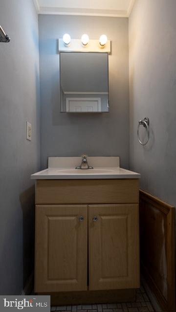 1911 Brunner Street Philadelphia, PA 19140 - Photo 9 of 12 a utility room with a sink a vanity and mirror
