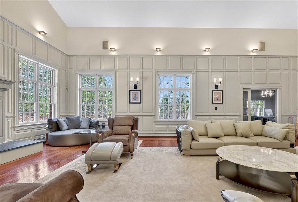 451 Wellesley Street Weston, MA 02493 - Photo 5 of 28 a living room with furniture and a large window