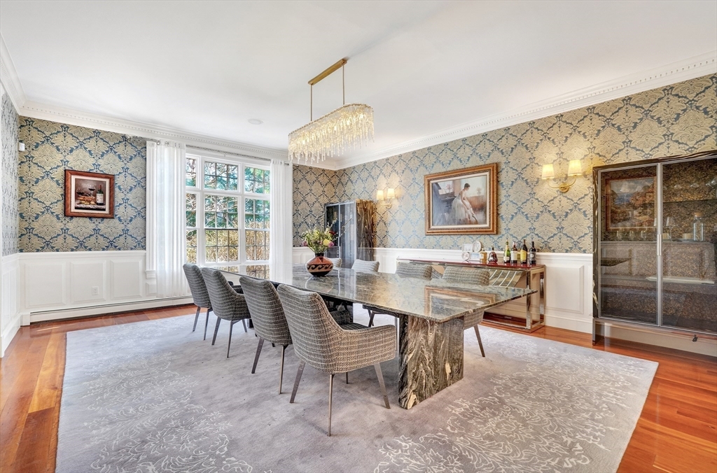 451 Wellesley Street Weston, MA 02493 - Photo 9 of 28 a view of a dining room with furniture and a chandelier