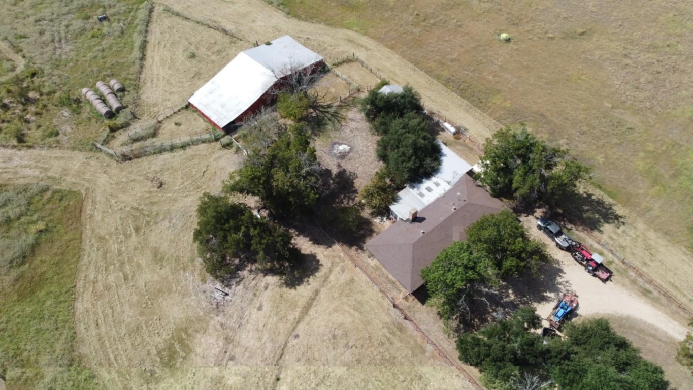 421 Farm To Market 845 Cameron, TX 76520 - Photo 4 of 37 an aerial view of a house a yard and mountain view in back