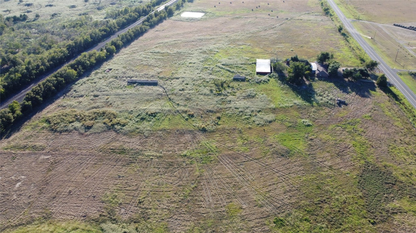 421 Farm To Market 845 Cameron, TX 76520 - Photo 7 of 37 a view of a dry yard with wooden floor