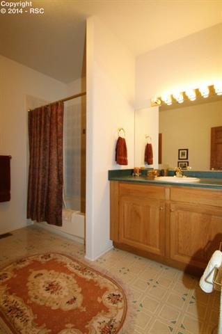 8020 Poco Road Colorado Springs, CO 80908 - Photo 15 of 25 Full Bedroom Suite and Hall Baths