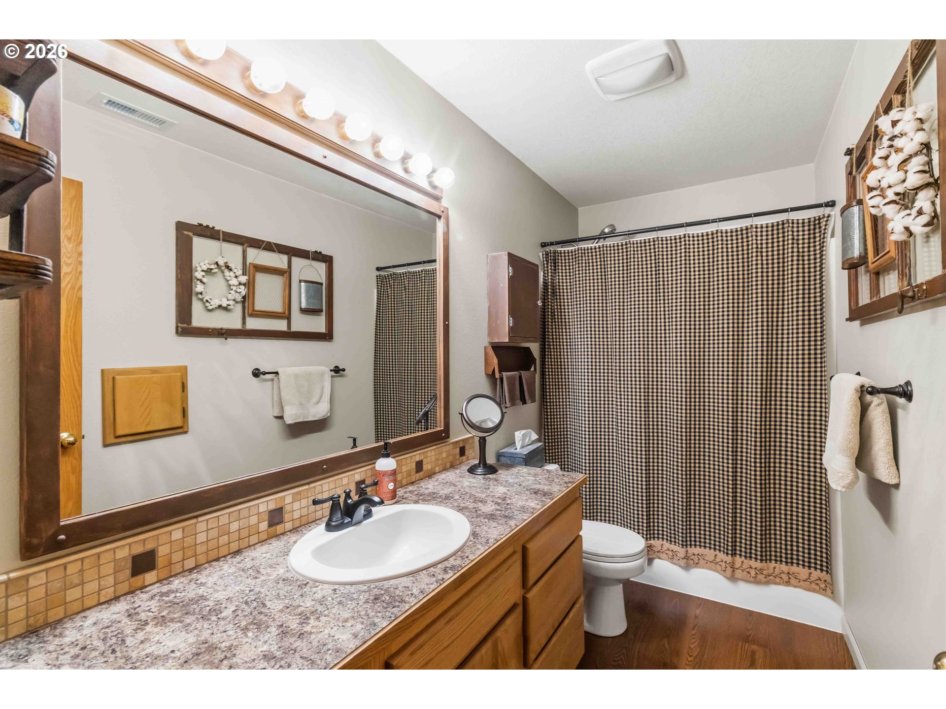 359 Frank Smith Road Toutle, WA 98649 - Photo 24 of 44 a bathroom with a sink and a mirror