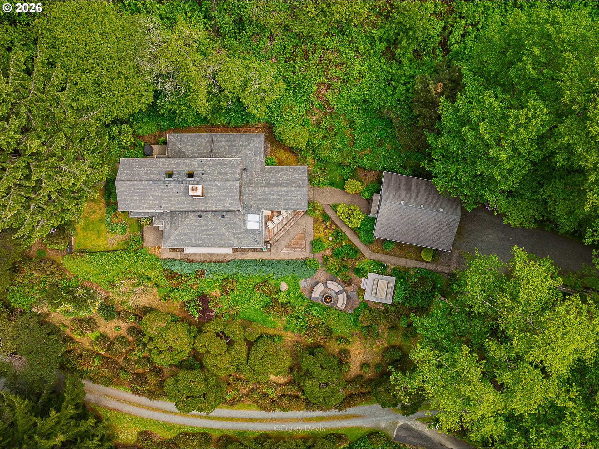 38295 Beulah Reed Road Nehalem, OR 97131 - Photo 8 of 42 an aerial view of a house with garden space and street view