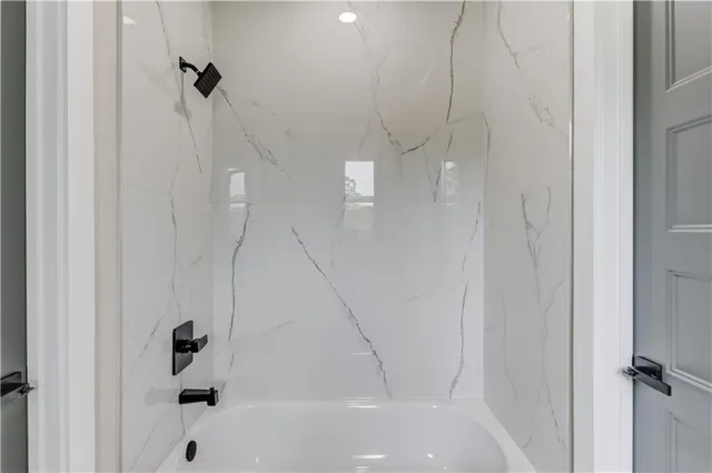 a view of backyard with swimming pool