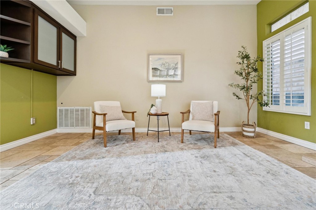 25528 Paine Circle Stevenson Ranch, CA 91381 - Photo 24 of 63 a living room with furniture and a window