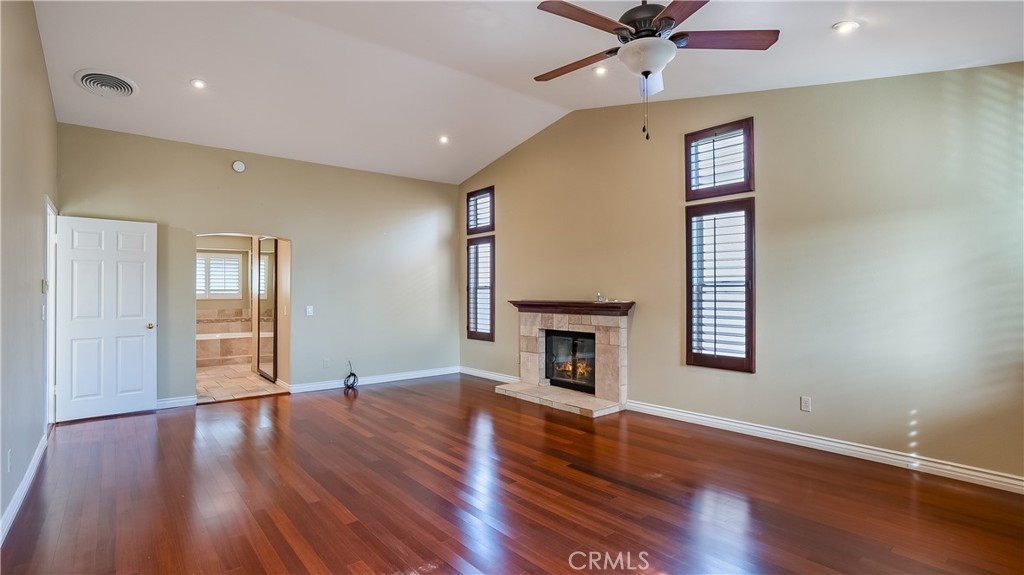 25528 Paine Circle Stevenson Ranch, CA 91381 - Photo 34 of 63 a view of livingroom with hardwood floor and a ceiling fan