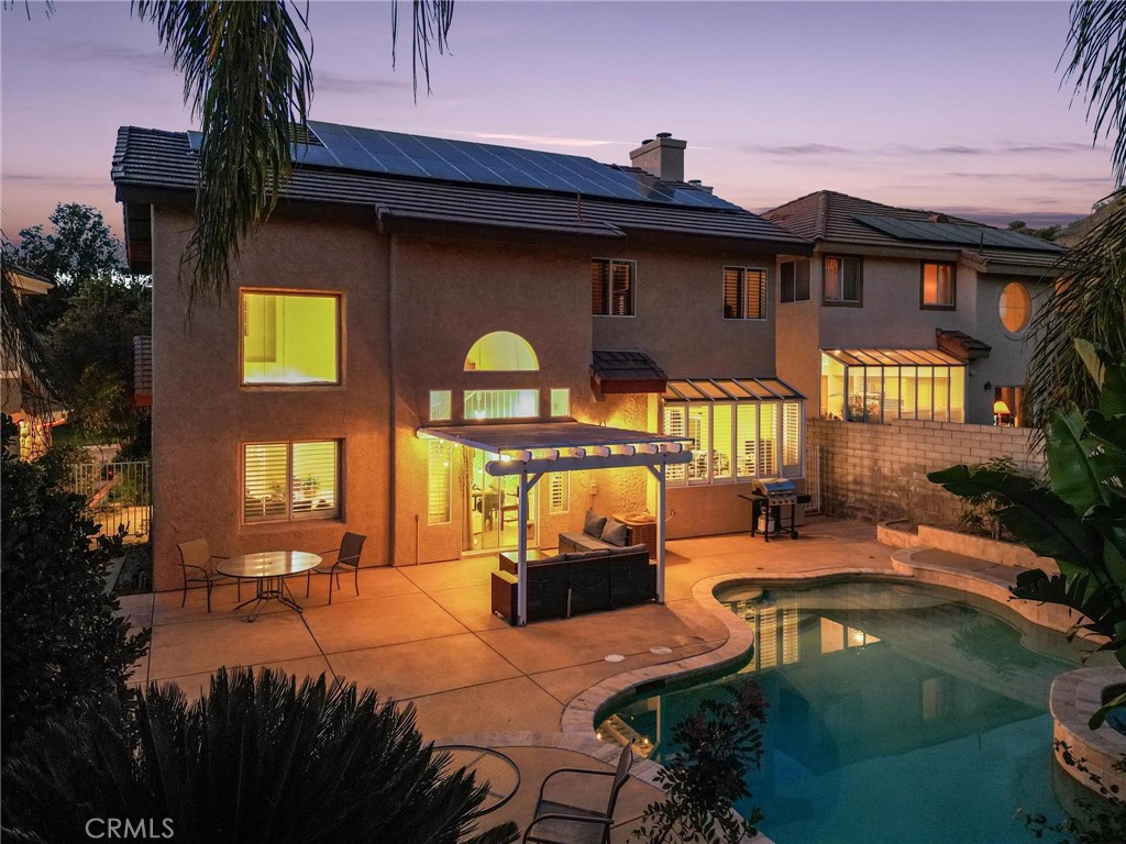25528 Paine Circle Stevenson Ranch, CA 91381 - Photo 4 of 63 a view of swimming pool with outdoor seating