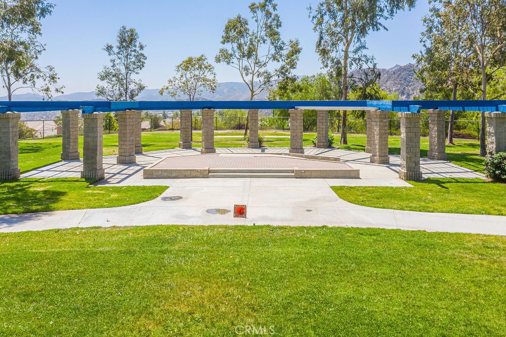 25528 Paine Circle Stevenson Ranch, CA 91381 - Photo 60 of 63 a view of swimming pool with a yard and sitting area
