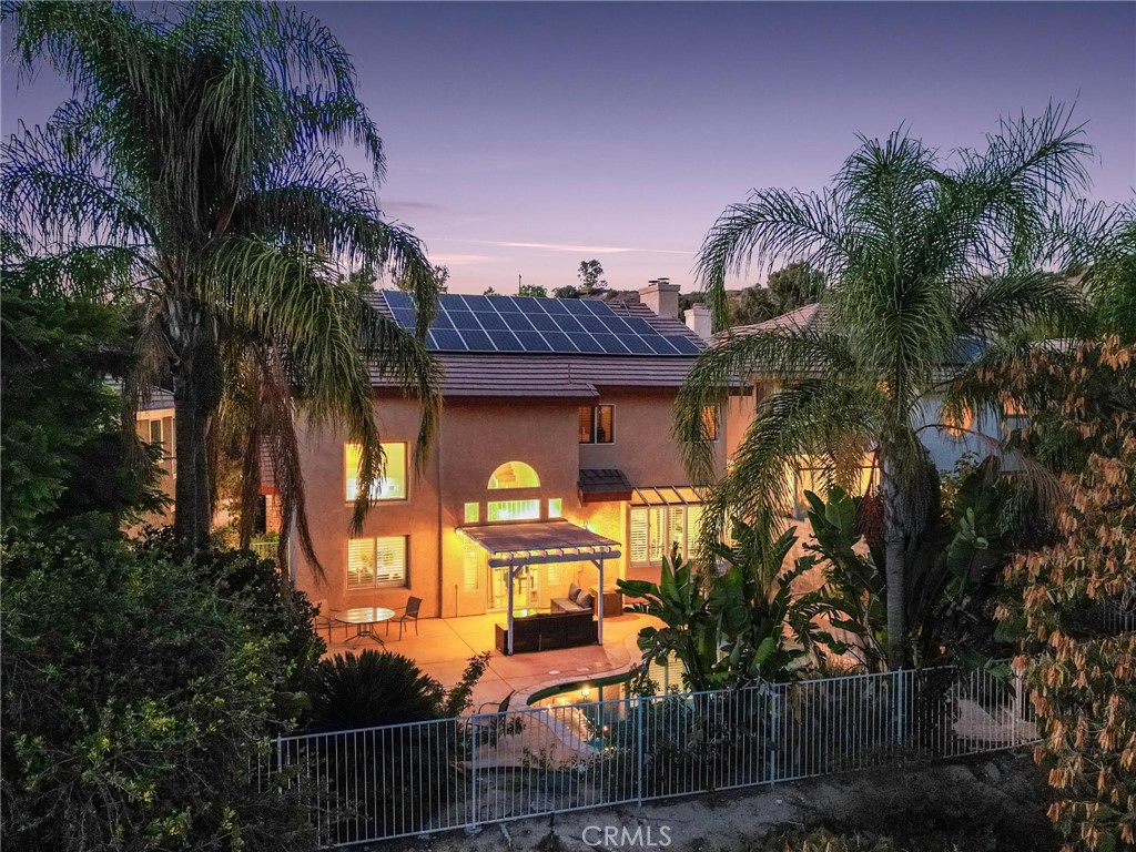 25528 Paine Circle Stevenson Ranch, CA 91381 - Photo 10 of 63 a front view of a house with a garden