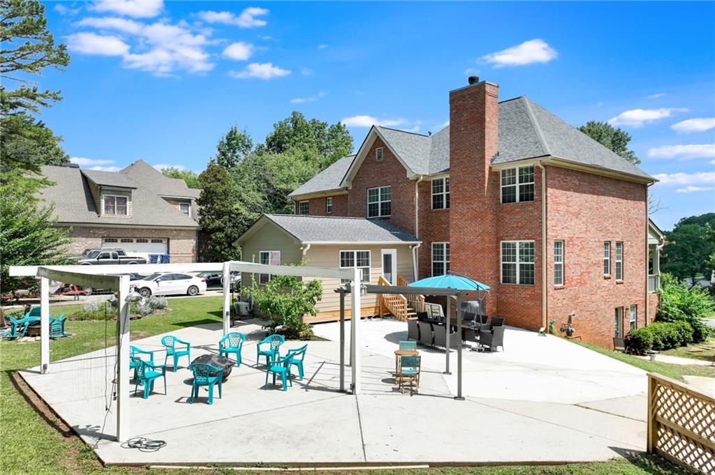 32 St Ives Circle Winder, GA 30680 - Photo 6 of 38 a view of a patio with chairs and potted plants