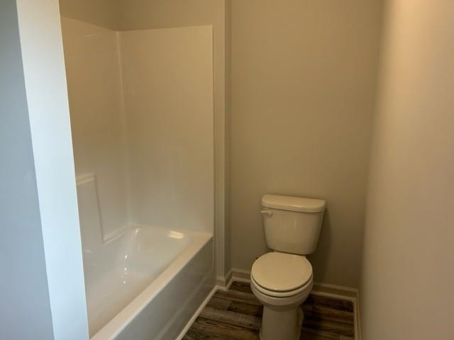280 Riley Way Spring Hope, NC 27882 - Photo 24 of 29 a white toilet sitting next to a sink
