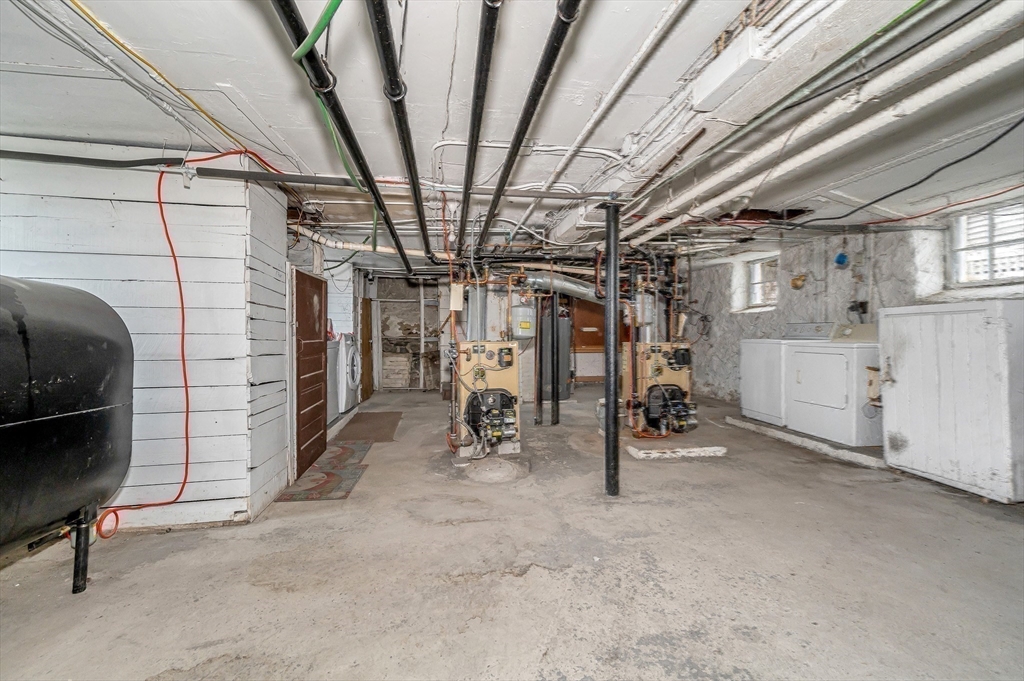 481 Lagrange Street Boston, MA 02132 - Photo 28 of 32 a view of empty room with wooden ceiling