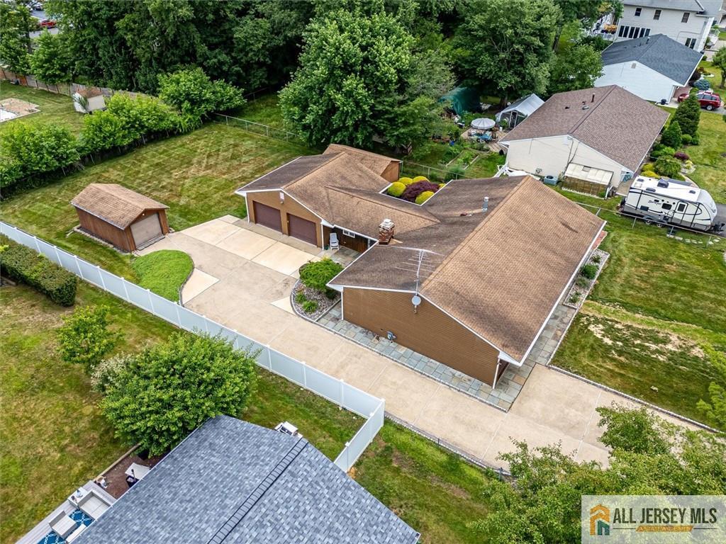 21 Tyndall Road Kendall Park, NJ 08824 - Photo 28 of 33 an aerial view of a house with garden space and street view