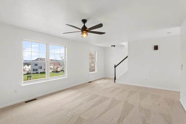 a view of a big room with carpet