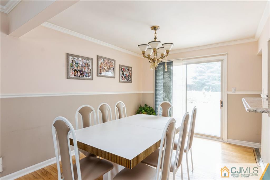 33 Dusko Drive Sayreville, NJ 08859 - Photo 11 of 30 a view of a dining room with furniture window and outside view