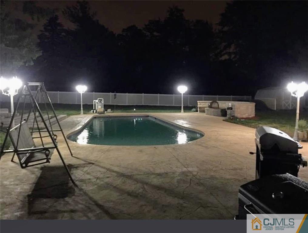 33 Dusko Drive Sayreville, NJ 08859 - Photo 26 of 30 a view of a room with gym equipment