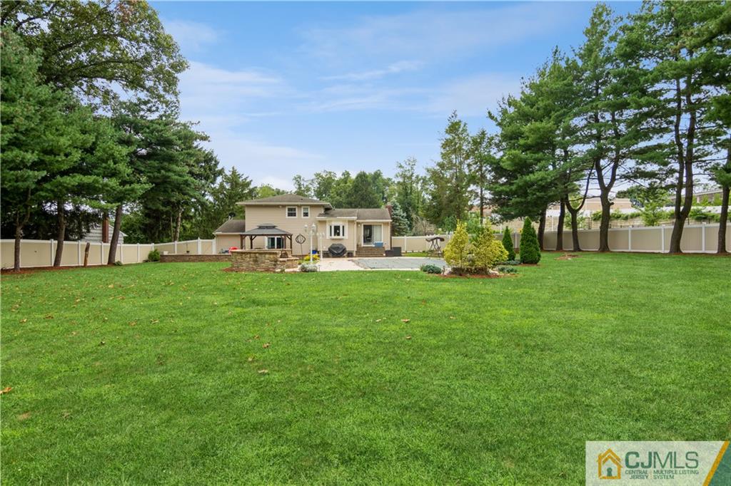 33 Dusko Drive Sayreville, NJ 08859 - Photo 27 of 30 a view of house with backyard