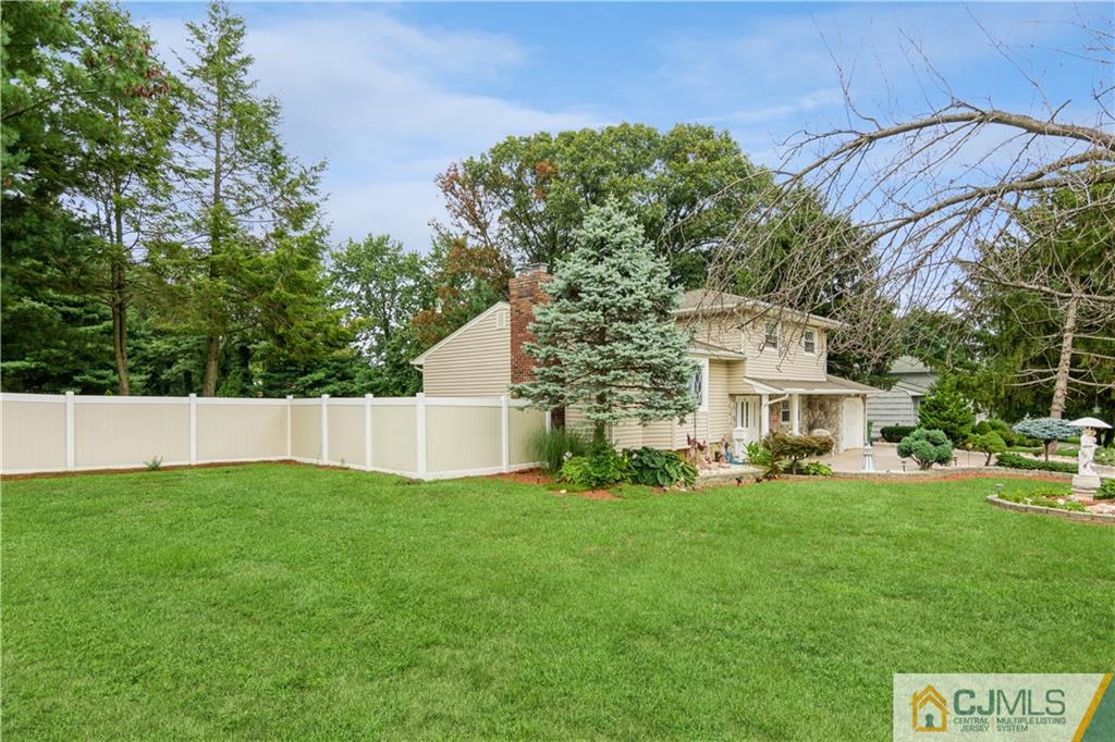 33 Dusko Drive Sayreville, NJ 08859 - Photo 28 of 30 a view of a house with a yard and sitting area