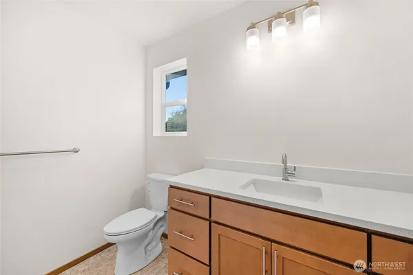 a bathroom with a sink and a toilet