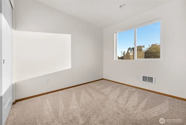 a view of a room with a window