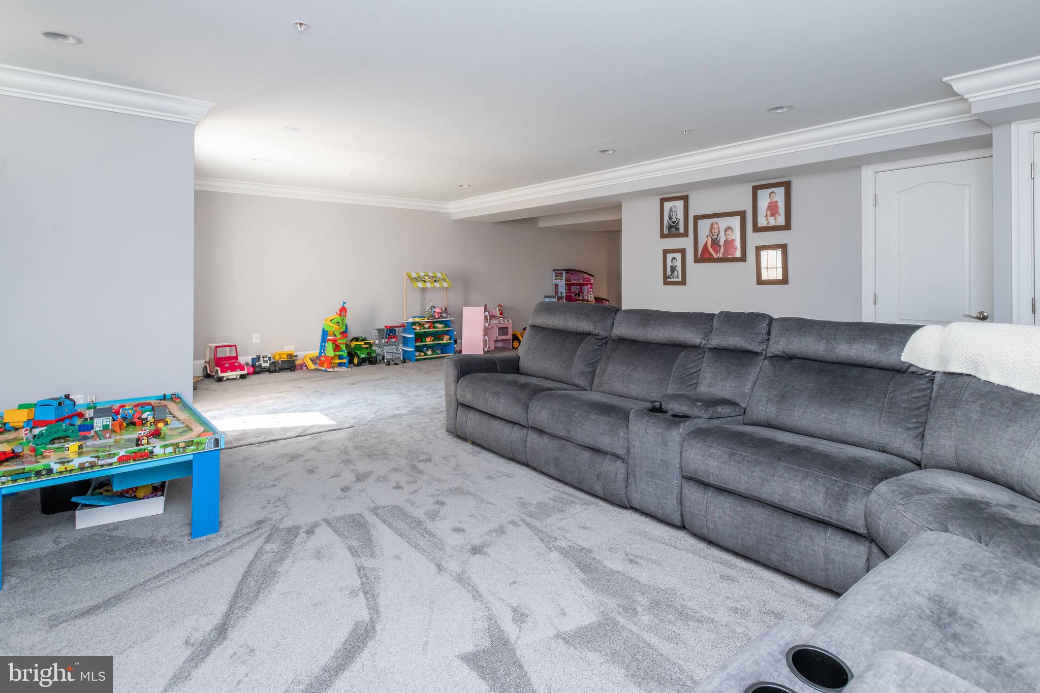6711 Evanston Road Baltimore, MD 21209 - Photo 25 of 59 Spacious lower level family room with walk-out