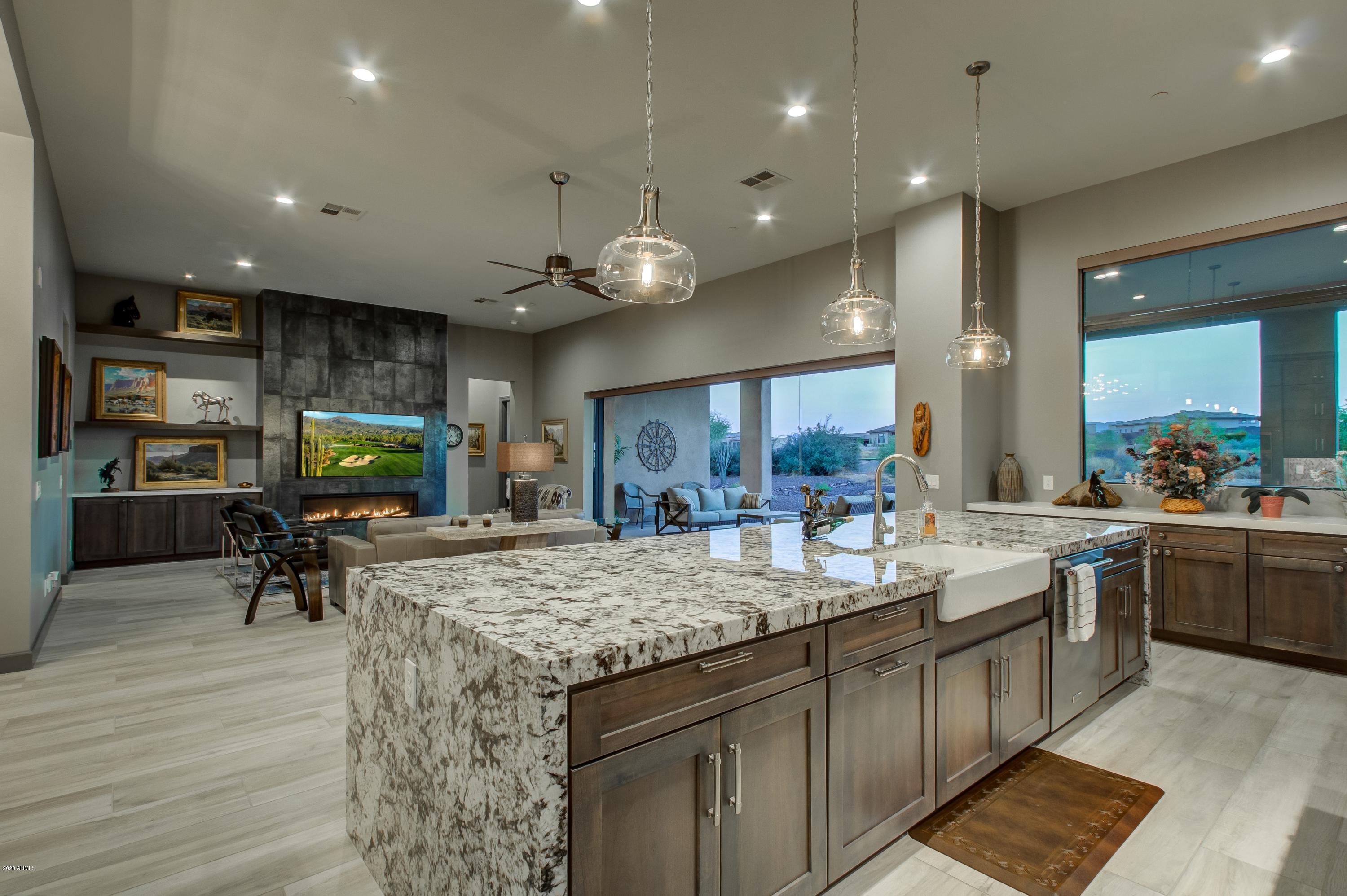 29324 North Round Butte Road Rio Verde, AZ 85263 - Photo 11 of 33 a large kitchen with lots of counter space and sink