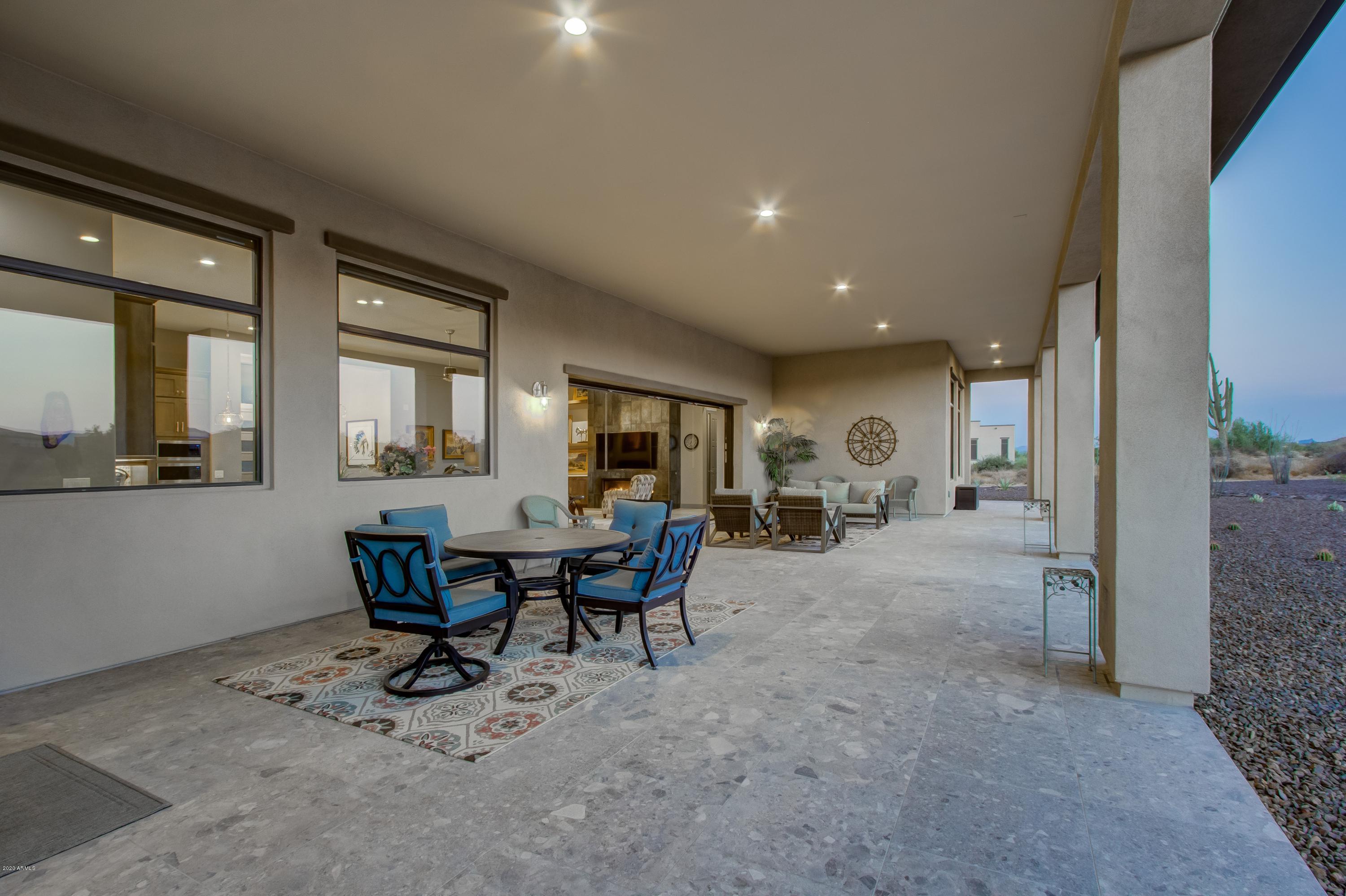 29324 North Round Butte Road Rio Verde, AZ 85263 - Photo 22 of 33 a view of a livingroom with furniture window and outside view