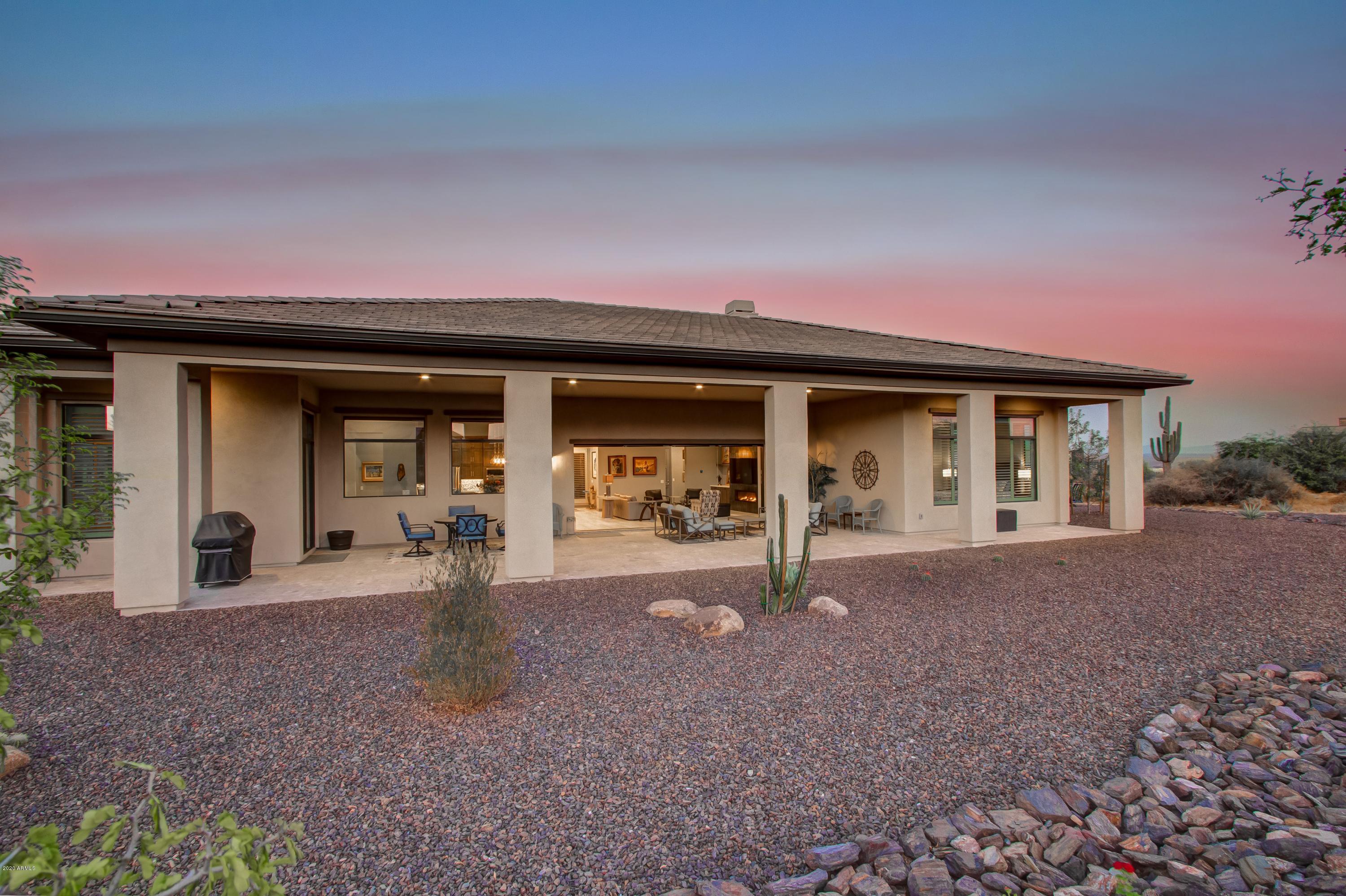29324 North Round Butte Road Rio Verde, AZ 85263 - Photo 23 of 33 a front view of a house with a yard