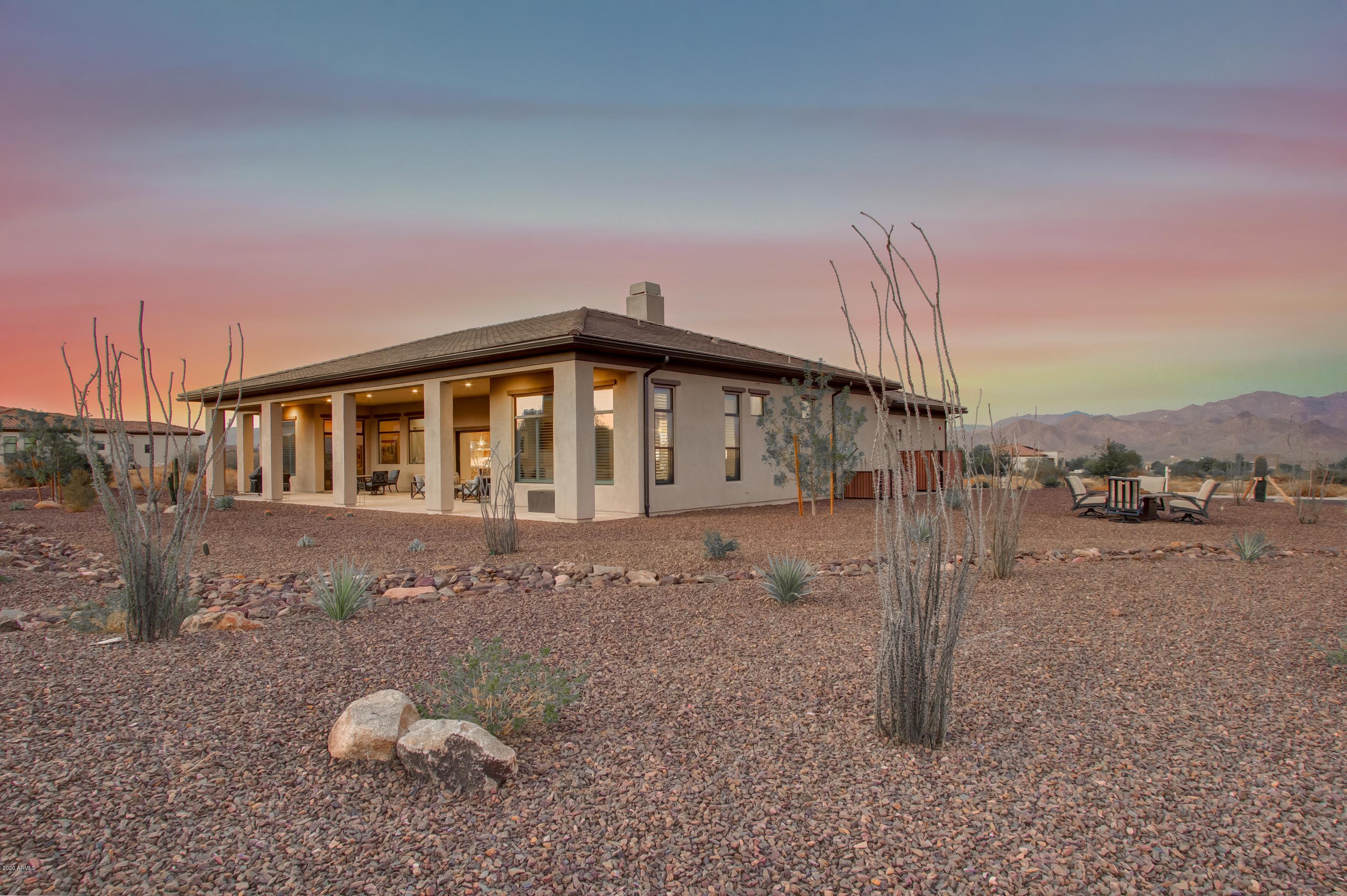 29324 North Round Butte Road Rio Verde, AZ 85263 - Photo 25 of 33 a front view of a house with a yard
