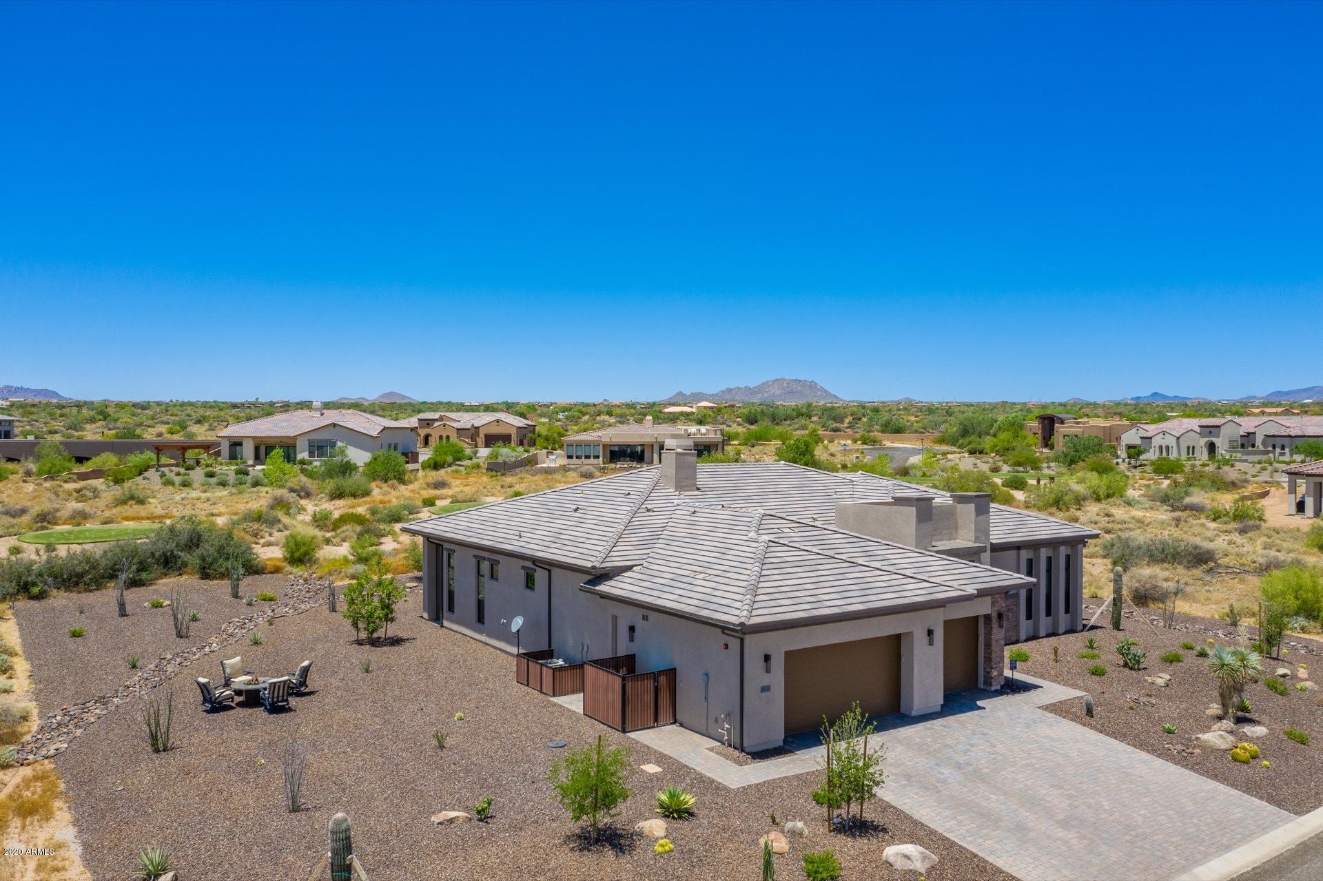 29324 North Round Butte Road Rio Verde, AZ 85263 - Photo 28 of 33 an aerial view of residential houses with outdoor space
