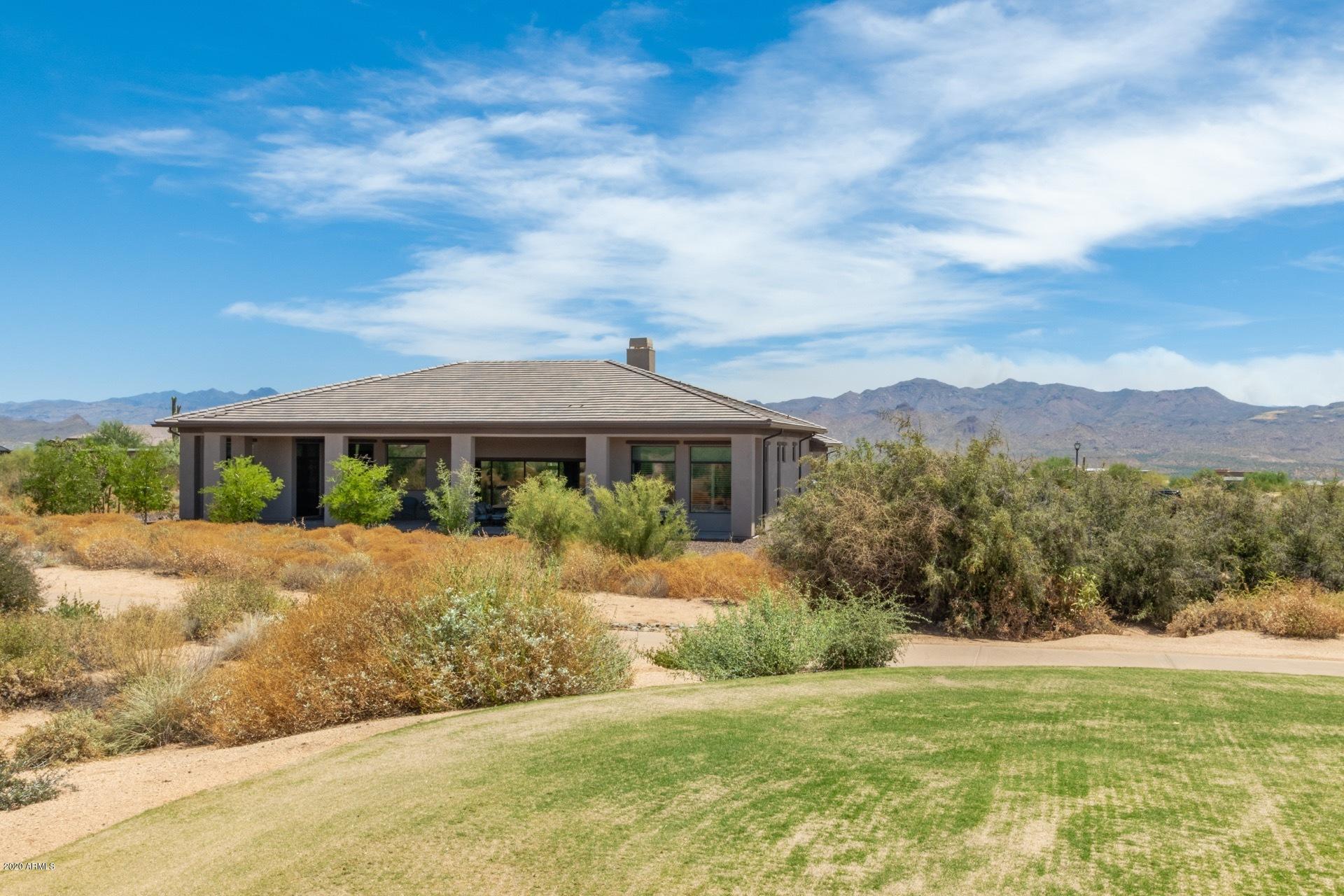 29324 North Round Butte Road Rio Verde, AZ 85263 - Photo 29 of 33 a front view of a house with a yard