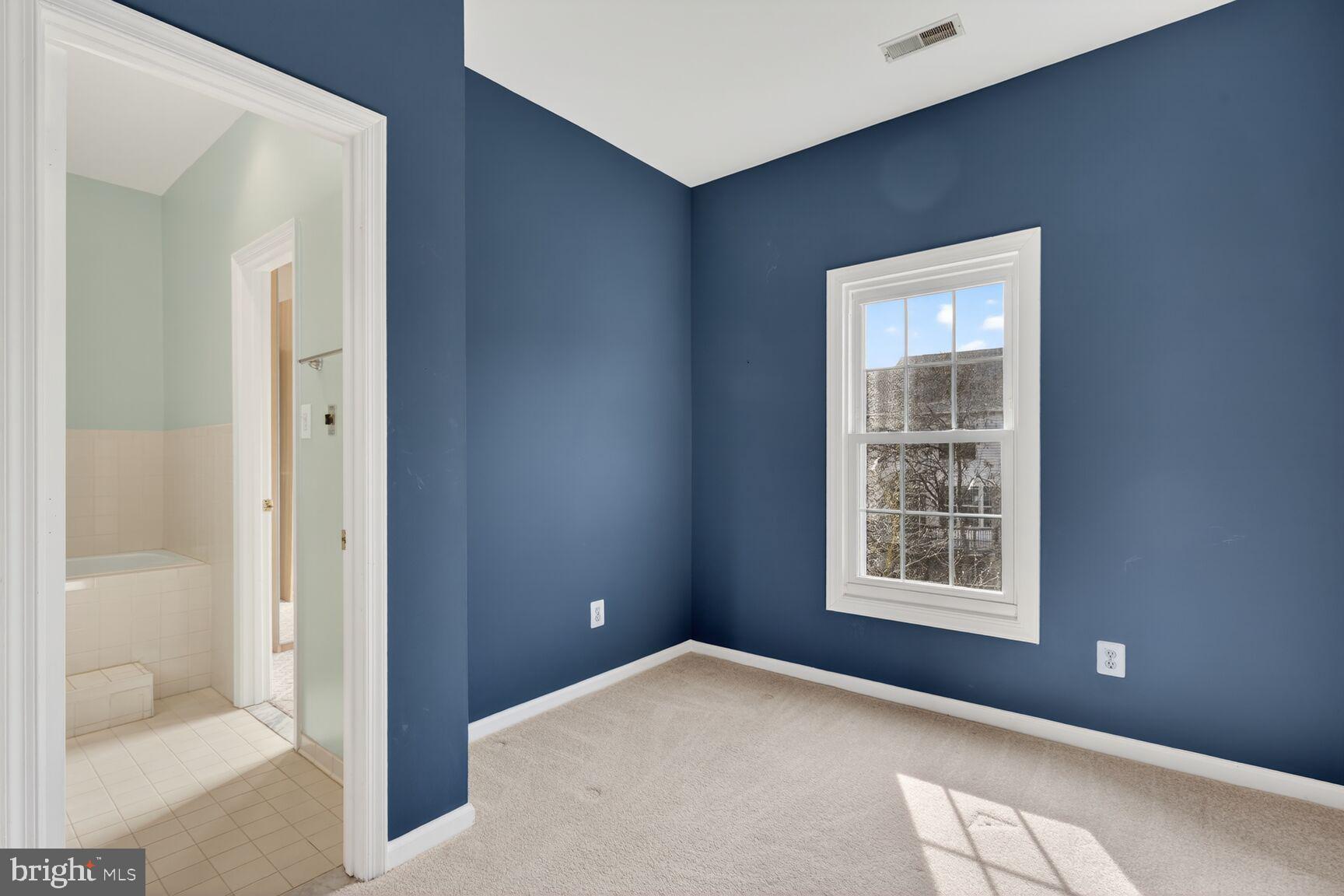 119 River Road Occoquan, VA 22125 - Photo 12 of 36 a view of an empty room with windows