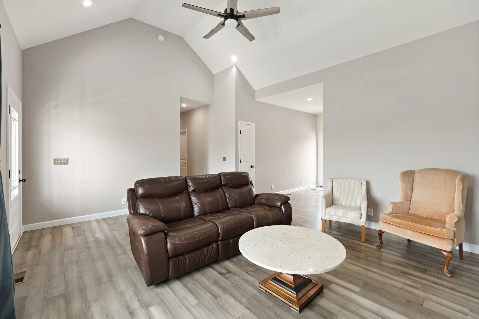 1225 Oak Grove Road Dickson, TN 37055 - Photo 3 of 14 a living room with furniture a window and a potted plant