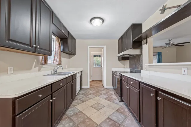 a bathroom with a bathtub and window