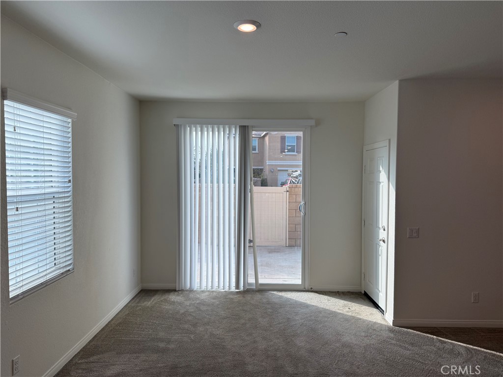 4751 Java Paseo South Ontario, CA 91762 - Photo 9 of 18 Direct garage access to family room and kitchen