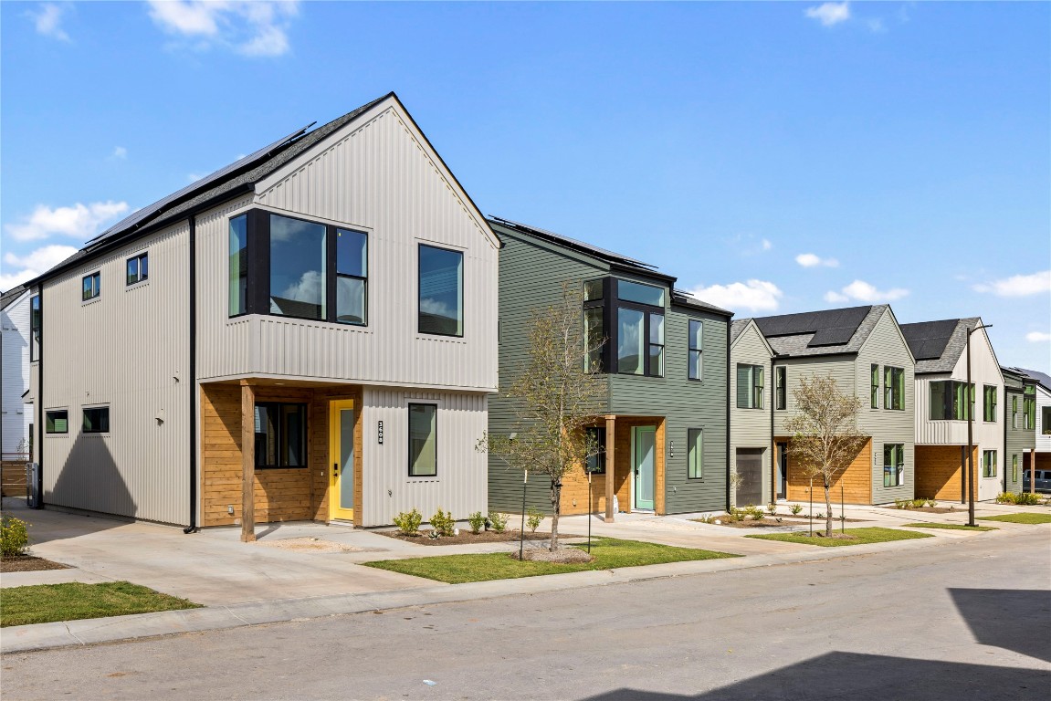 3702 Curious Path Austin, TX 78723 - Photo 6 of 10 a front view of multiple houses