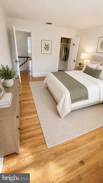 241 Edwards Ferry Road Northeast Leesburg, VA 20176 - Photo 28 of 41 Serene bedroom with natural light.