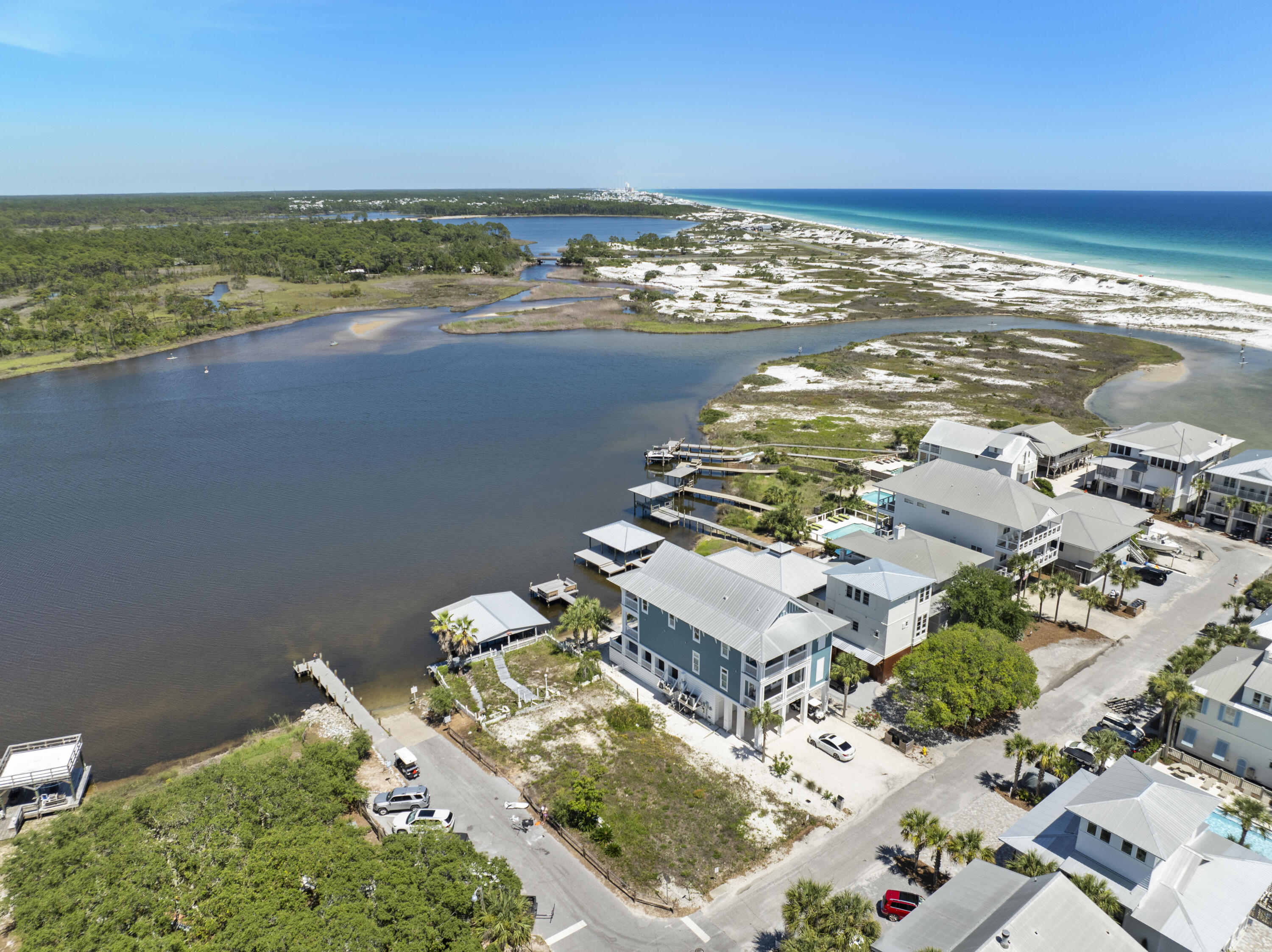 109 Banfill Road Santa Rosa Beach, FL 32459 - Photo 23 of 32 an aerial view of ocean and residential houses with outdoor space
